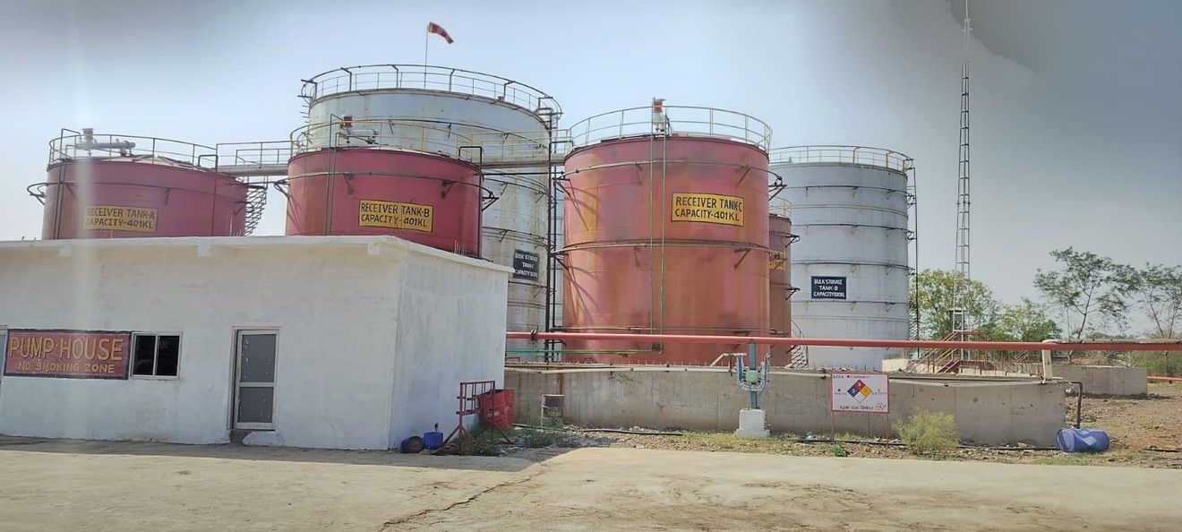 Ethanol receiver and bulk storage tanks with the pump house at the Bachai distillery